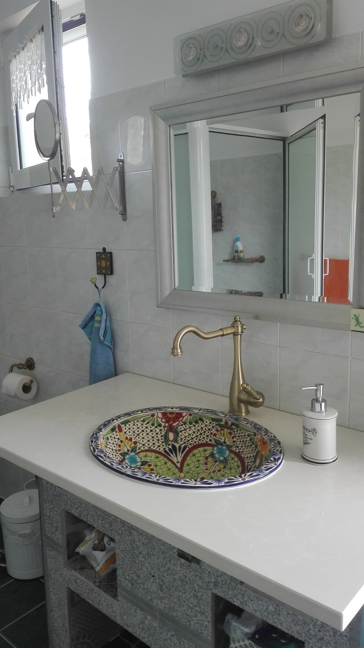 Bathroom with hand-painted ceramic basin